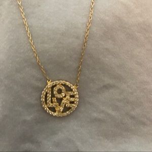 Gold plated love inscribed crystal necklace!